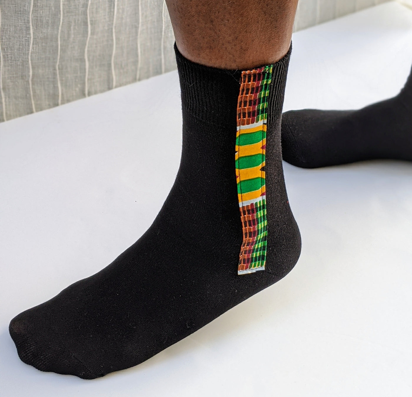 Socks with multi-coloured Kente print