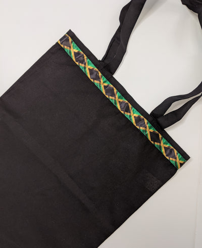 Black tote bag and purse with Jamaica flag detail