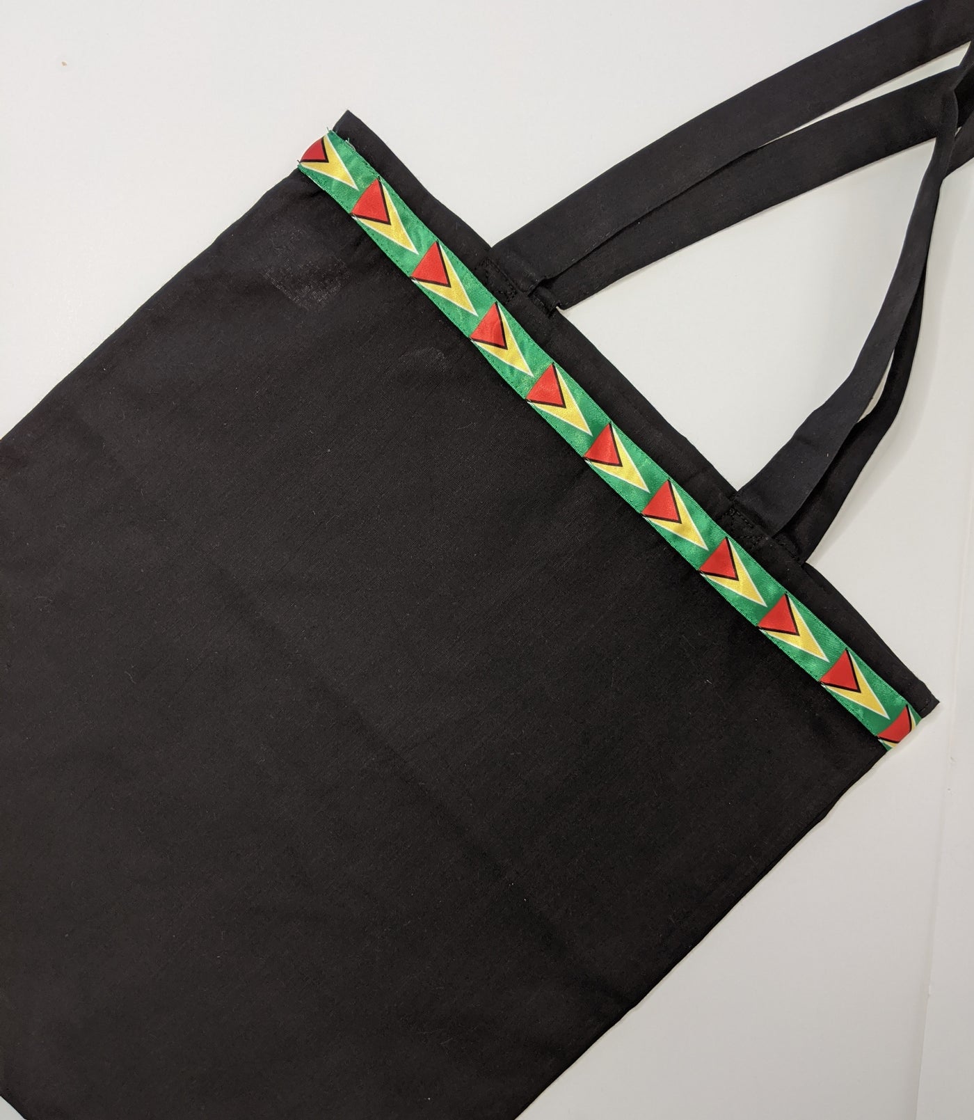 Black tote bag with Guyana flag detail